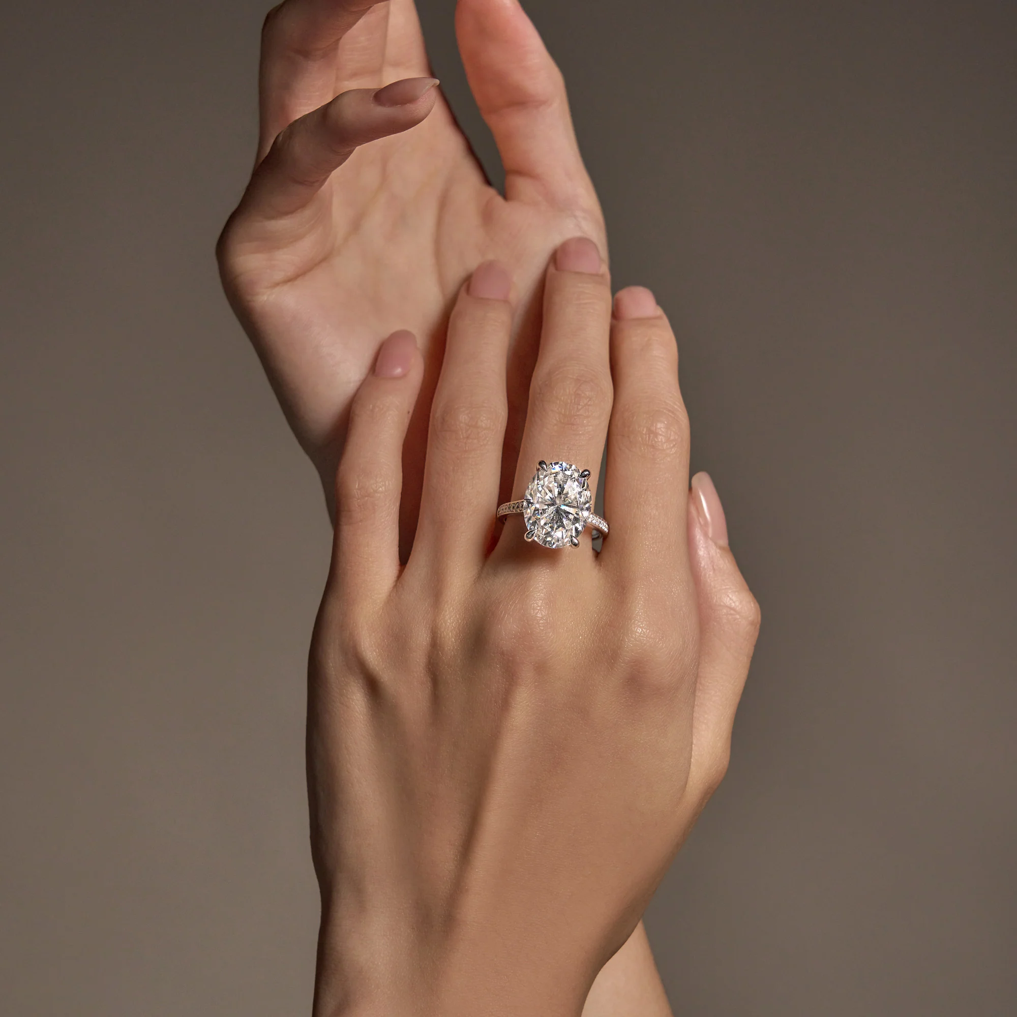 14 Carat Oval Shaped Moissanite Paved Engagement Ring in 14K Gold - Image 10