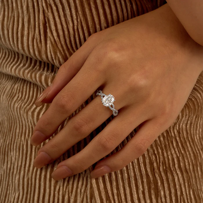 Oval Moissanite Ring with Pavé Infinity Twist Band - Image 13