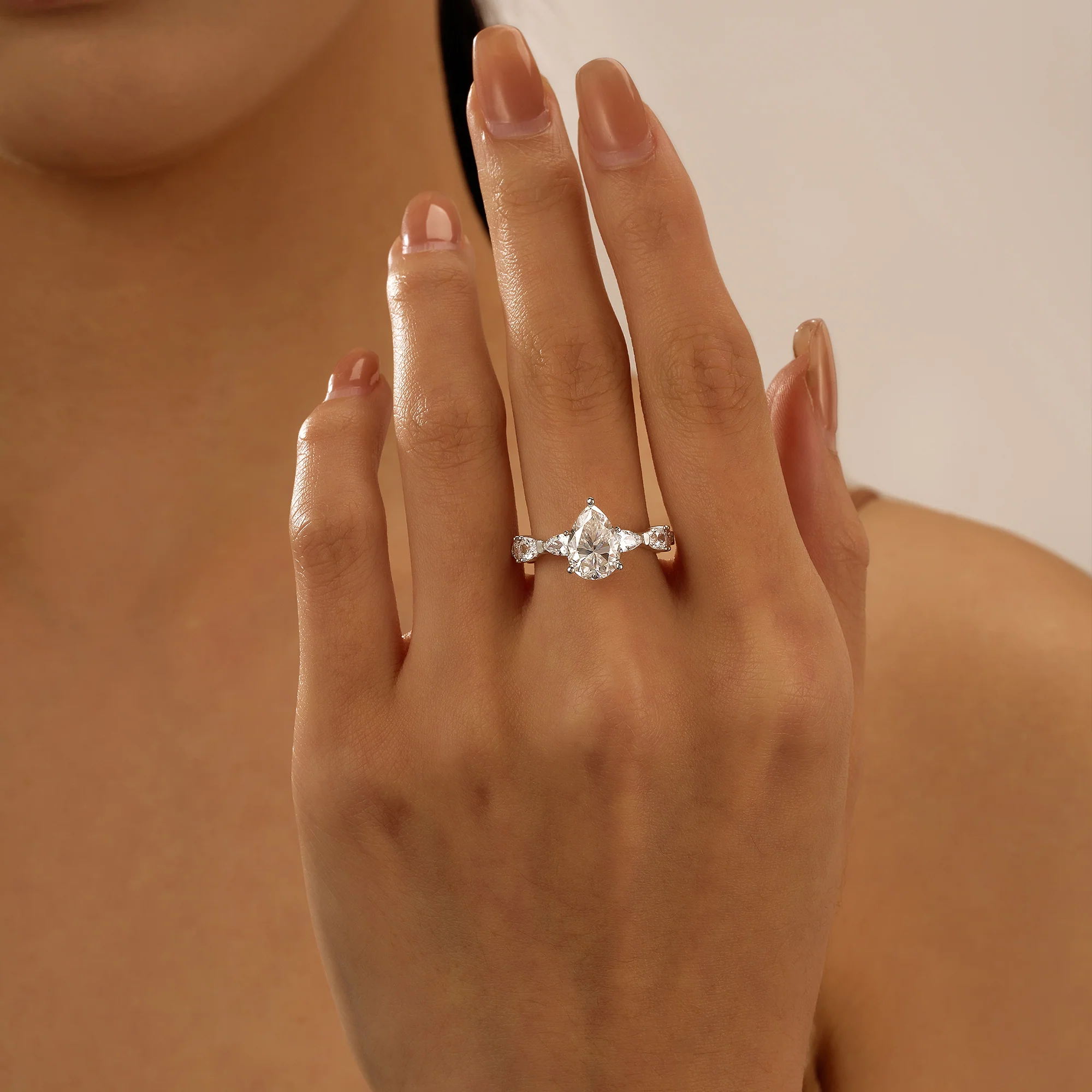 Nature Inspired Pear Cut Moissanite Ring with Full Accent Stones - Image 11