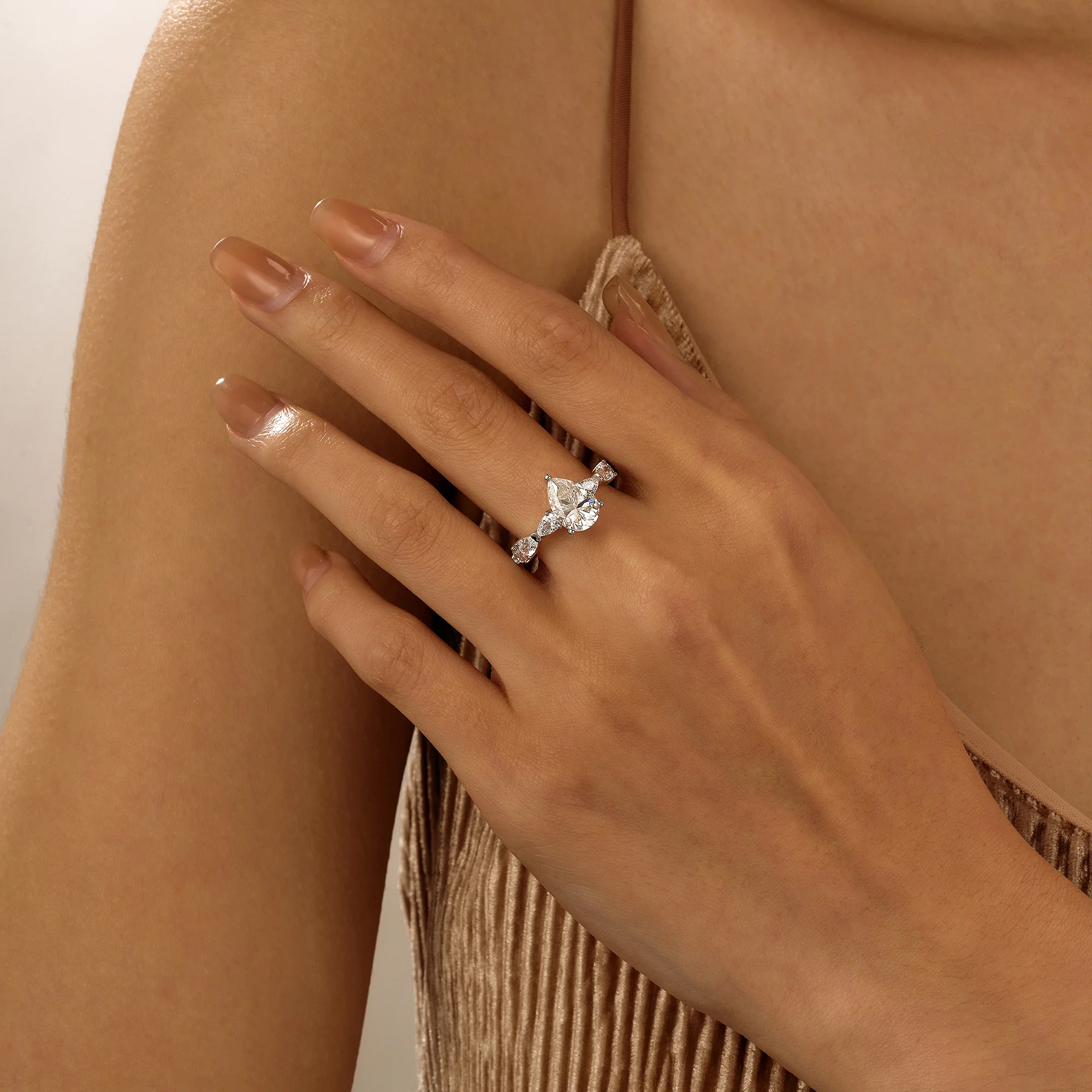Nature Inspired Pear Cut Moissanite Ring with Full Accent Stones - Image 13