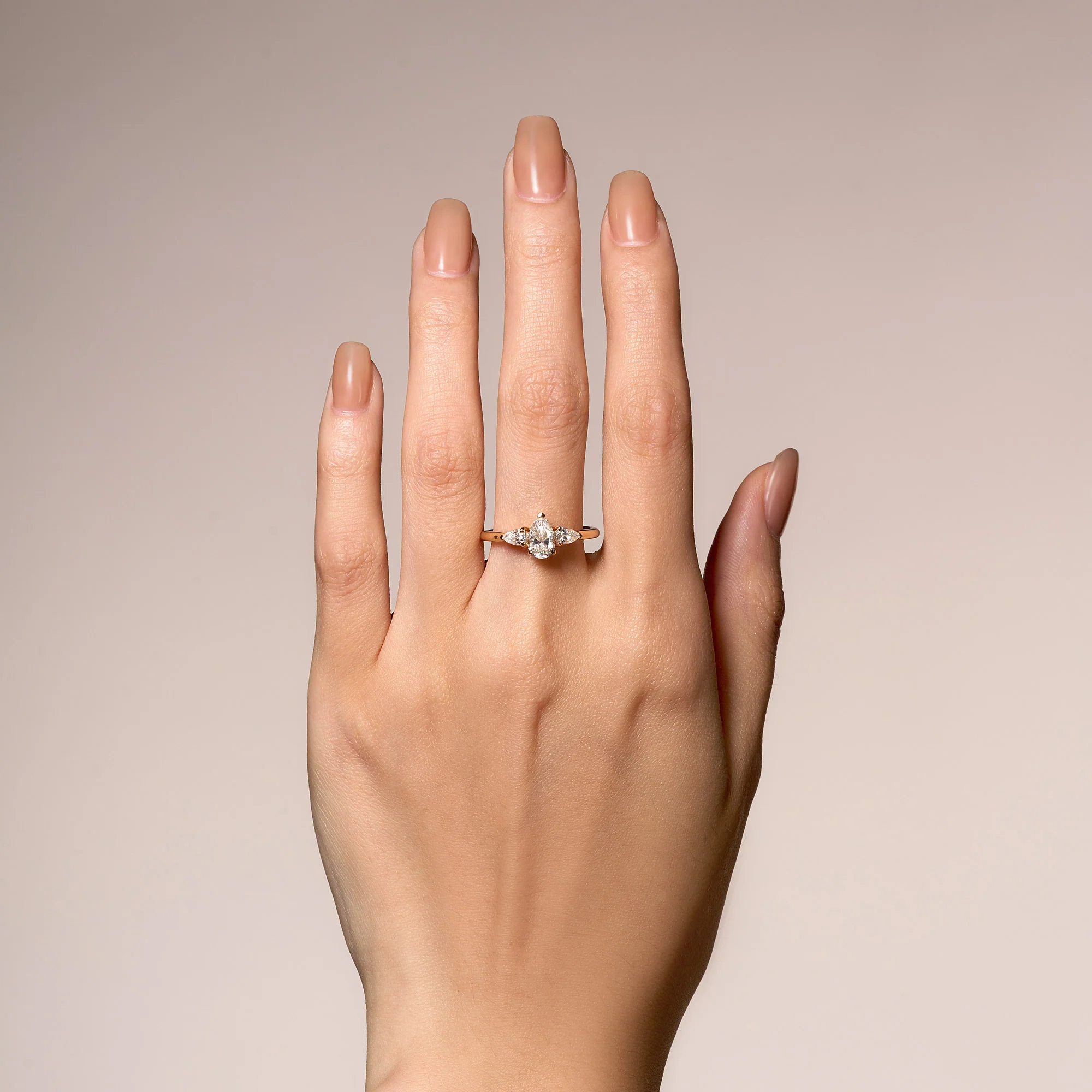 Pear Cut Moissanite Three Stone Ring - Image 10