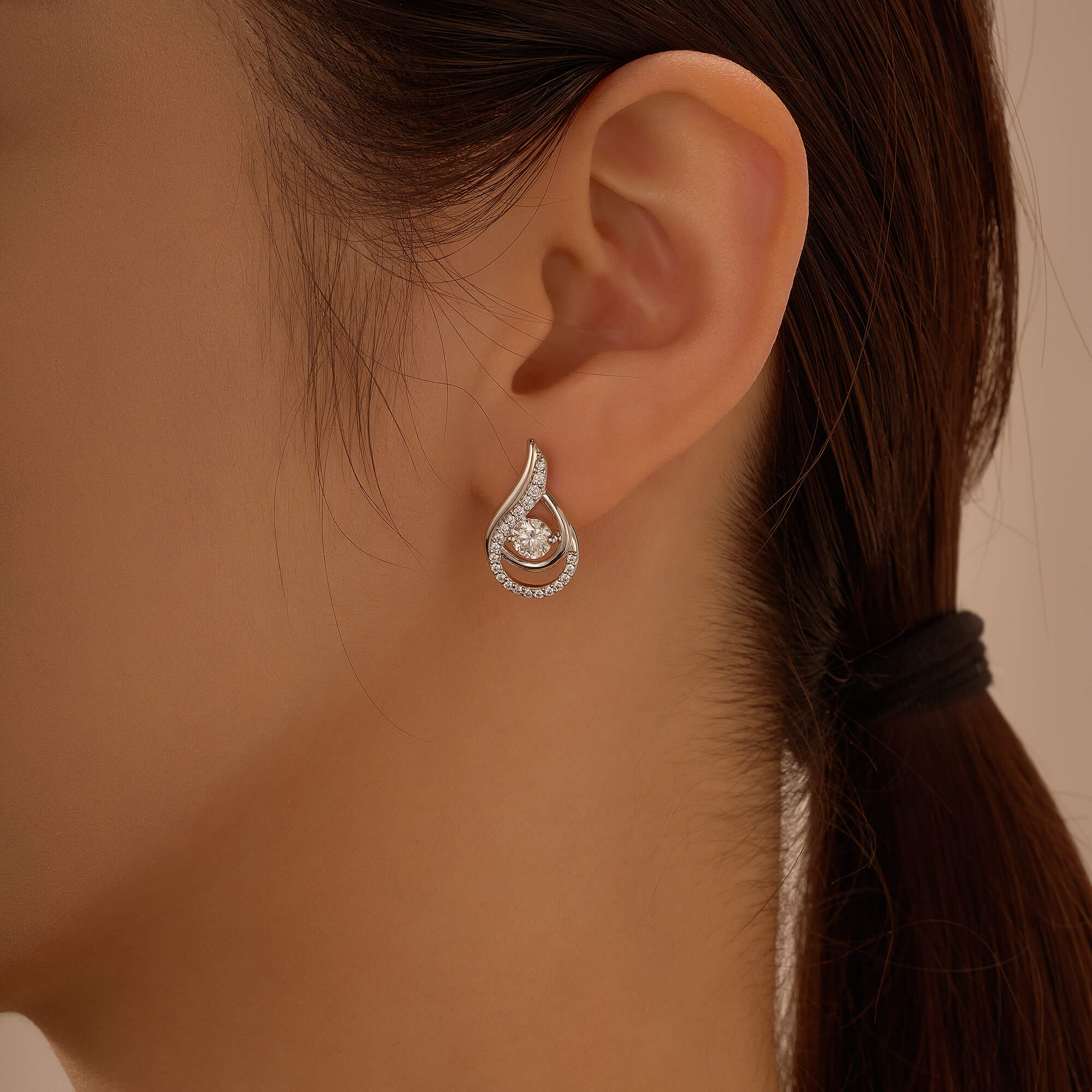 Sophisticated Round Moissanite Teardrop Earrings - Image 10